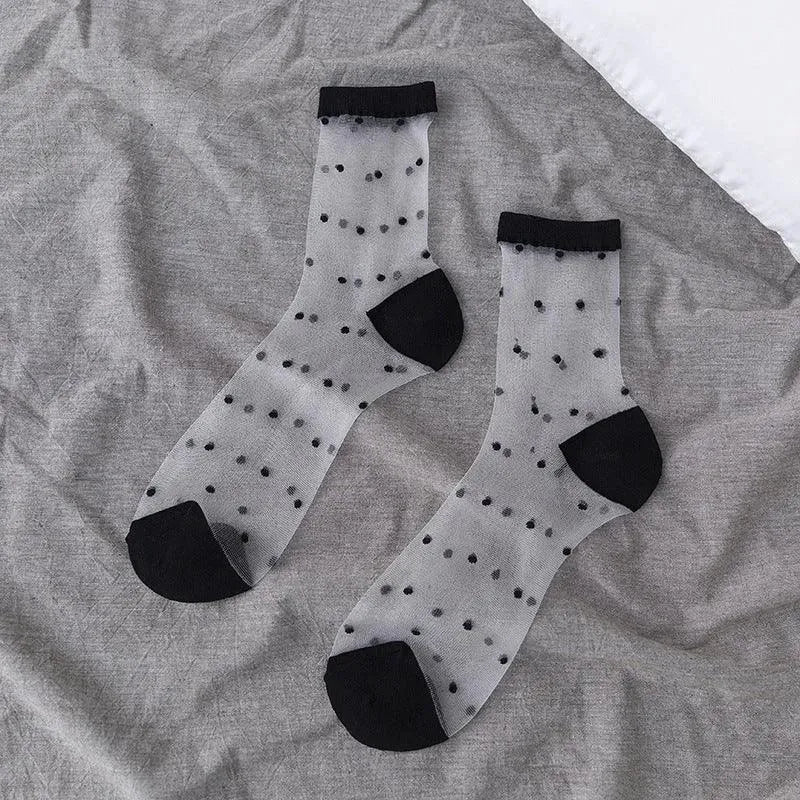 Sheer socks with black polka dots