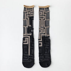 Black Maze Pattern sheer crew socks with tan geometric lines and contrasting rolled cuffs