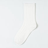Milk White crew sock with vertical diamond panels and a broad ribbed cuff
