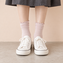 AI front outfit illustration of Light Pink fine-knit-looking socks with waved rims and softly rolled upper styling above white canvas shoes