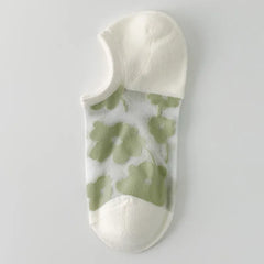 Matcha large-flower sheer liner sock with a white opening, toe and heel, shown as a single color sample