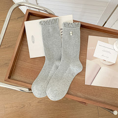 Light Gray ribbed socks with frill cuff and pearl-style accents, selected one-pair option