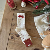 Milk White crew sock with red polka dots, a red bow and a red stripe below the cuff