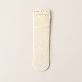 An Ivory rose lace sock displayed flat, showing horizontal openwork bands and a scalloped edge