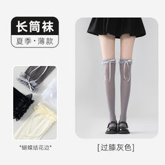 Gray long socks with ruffle cuffs and ribbon tails