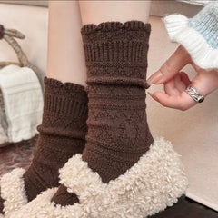Coffee brown crew socks with small scalloped cuffs and textured horizontal knit bands