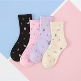 Starry crew socks in Black, Pink, Light Purple and Khaki displayed as separate one-pair color choices