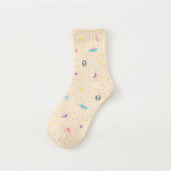Khaki crew sock with colorful planets, crescent moons and stars