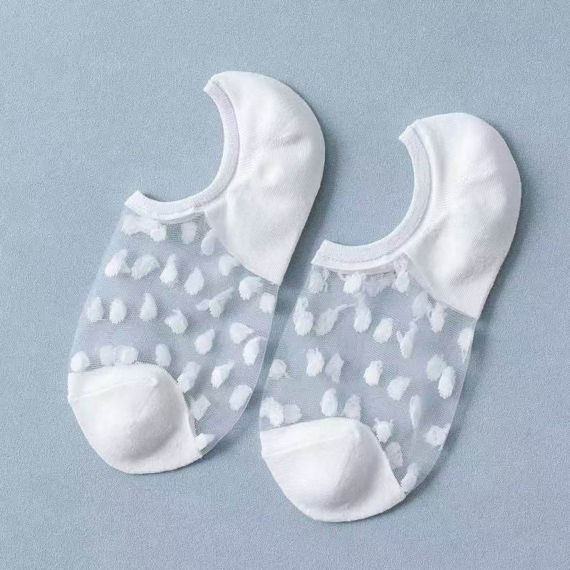 Pair of White sheer liner socks with small heart-like motifs and denser white toes and heels
