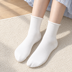 AI-assisted unshod view of white fine-rib roll-top socks