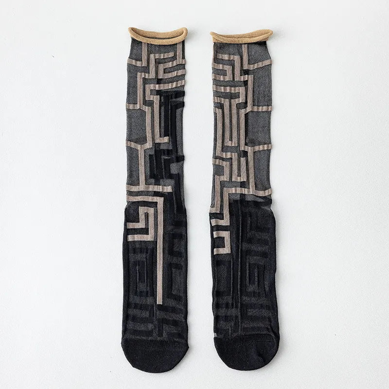 Black Maze Pattern sheer crew socks with tan geometric lines and contrasting rolled cuffs