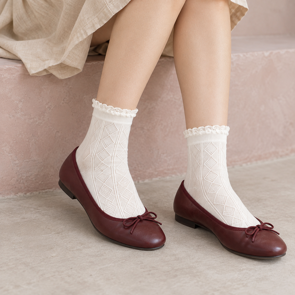 AI styling illustration of White tonal diamond socks with narrow frilled cuffs, worn with burgundy ballet flats beside a pink-grey step.