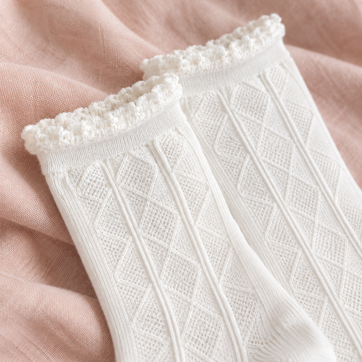AI detail illustration of the narrow frilled cuffs and elongated tonal diamond pattern on White socks.