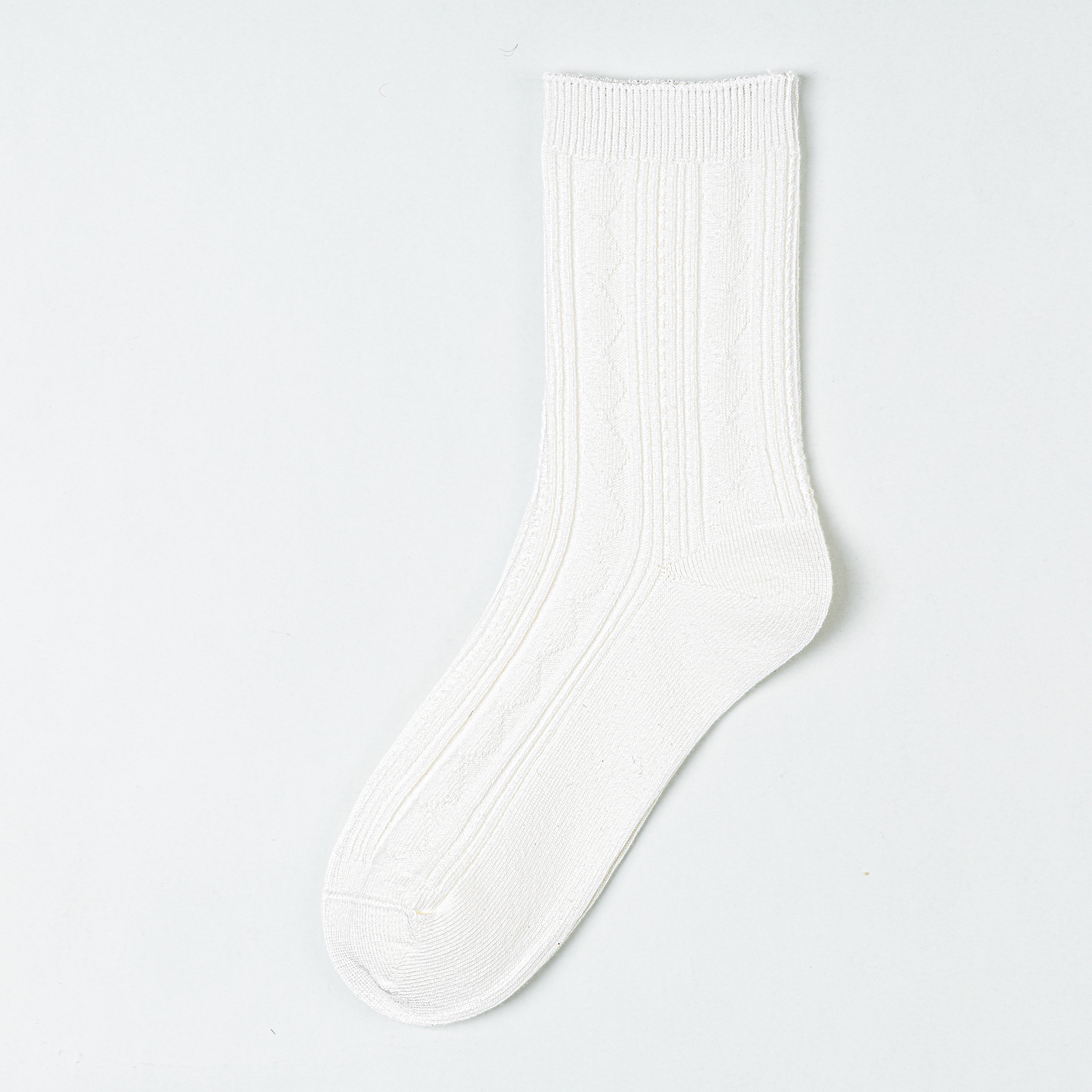 Milk White crew sock with vertical diamond panels and a broad ribbed cuff
