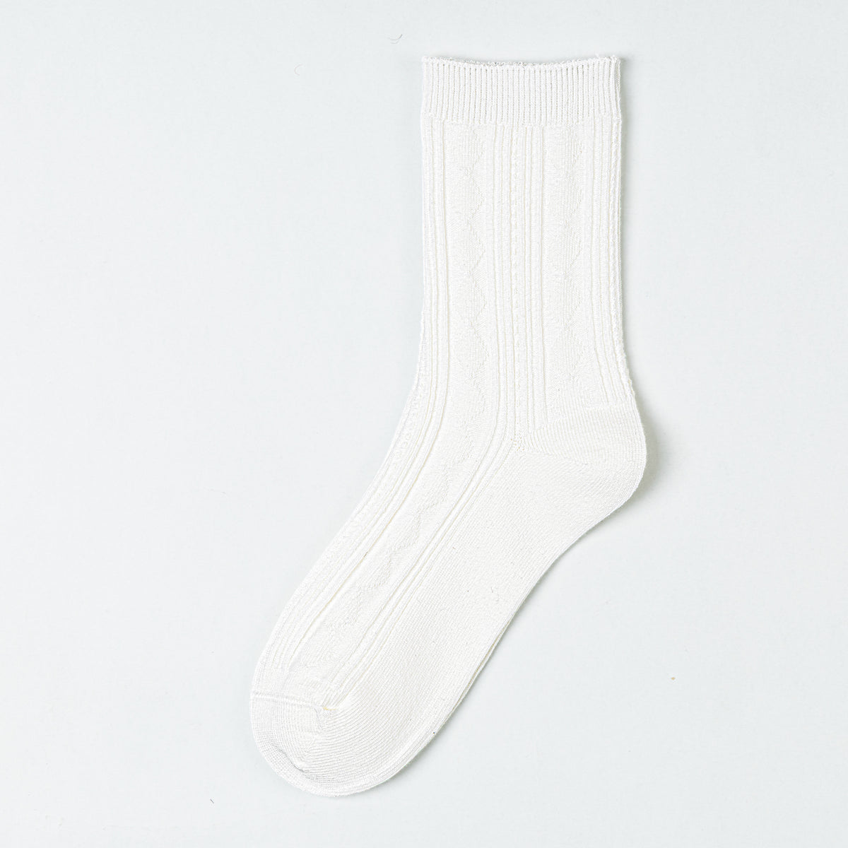 Milk White crew sock with vertical diamond panels and a broad ribbed cuff