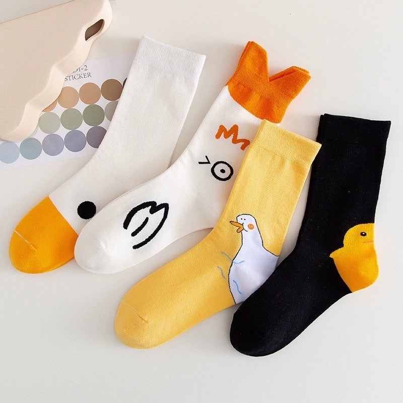 Four duck and goose sock designs displayed together as separate style choices, sold one selected pair at a time
