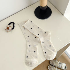 Beige dotted socks with rolled cuff edges