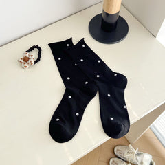 Black dotted socks with rolled cuff edges