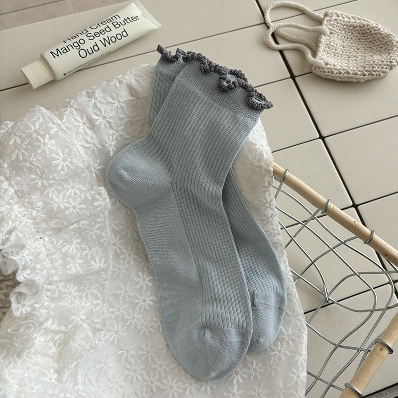 Original product reference of Light Blue socks with a muted blue-gray fine-rib body and dark-gray curled cuffs