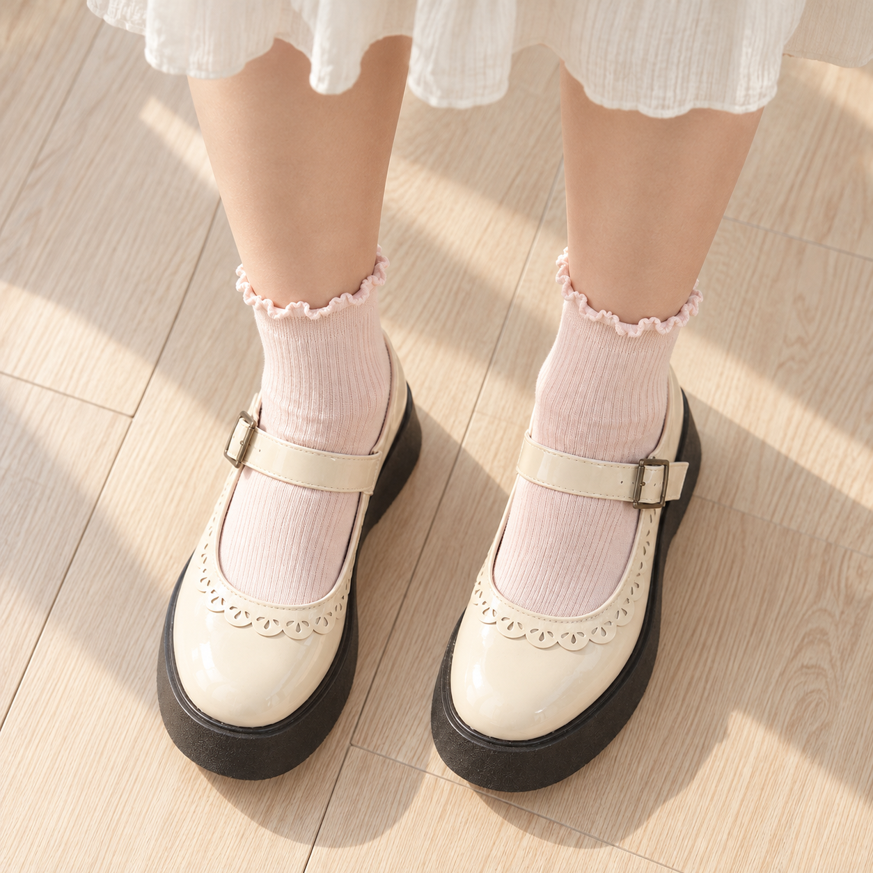 AI higher-angle pair illustration of Blush Pink fine-rib short socks with matching curled cuffs
