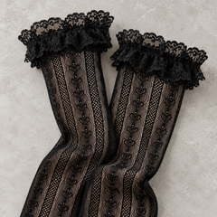 AI product illustration of gently folded Black heart-link mesh front panels and broad floral lace openings.