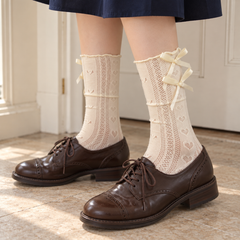 AI standing-outfit illustration of Milky White double-bow pointelle socks with dark brown Oxford shoes and a navy skirt
