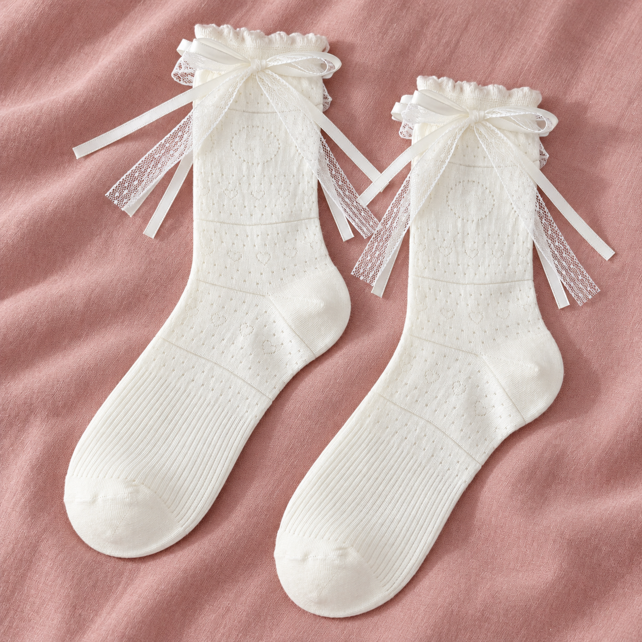 AI flatlay illustration of one White pair with tiny heart-like pointelle, fine horizontal bands and layered mesh-and-ribbon bows on muted rose fabric