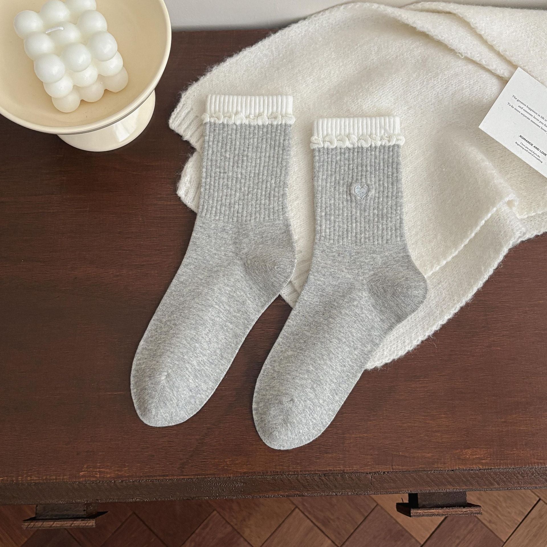 Untouched supplier reference of a Light Gray ribbed pair with contrasting white upper bands, curled white knit trim and a small gray heart.