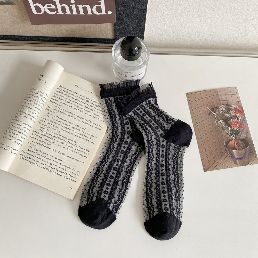 Untouched original reference of Black sheer socks with vertical flower-chain and wavy dotted stripes, short gathered cuff frills and solid Black toe and heel panels.