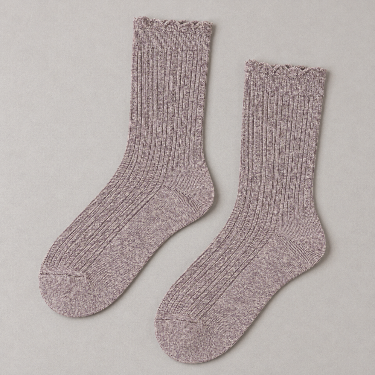 AI overhead product illustration of an empty Heather Taupe matching pair with fine vertical ribs, wavy openings, plain rounded toes and shaped heel profiles.