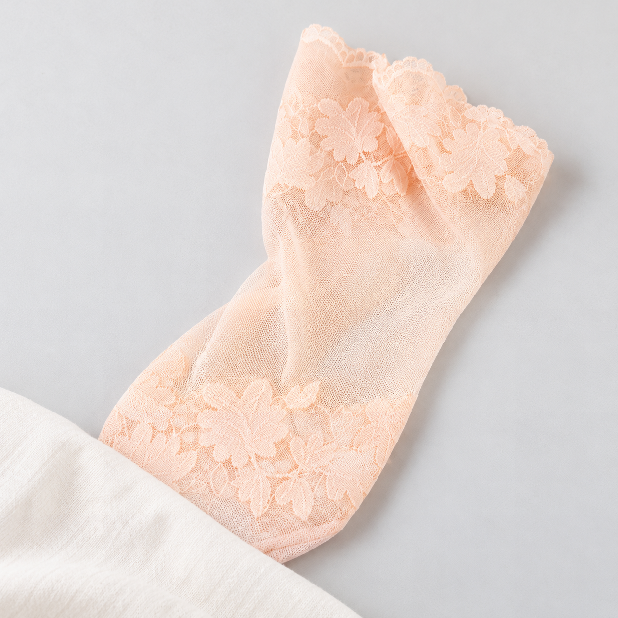 AI product detail illustration of the Pink floral lace zones and clear fine-mesh middle on gray card.