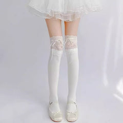 White long socks with wide floral lace cuffs and white ribbon detail, worn with Mary Janes