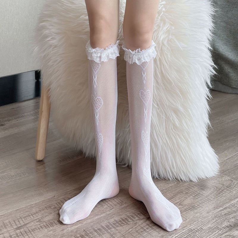 White mesh socks with linked outline hearts and crossed links down the front, finished with white lace and bows