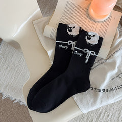 Black Lamb crew socks, sold as one pair in the selected style