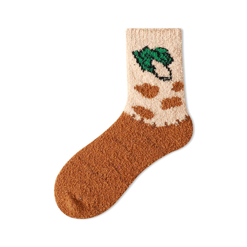 Single fuzzy crew sock with a dark orange foot, pale cream shaft, orange spots and a green broccoli motif