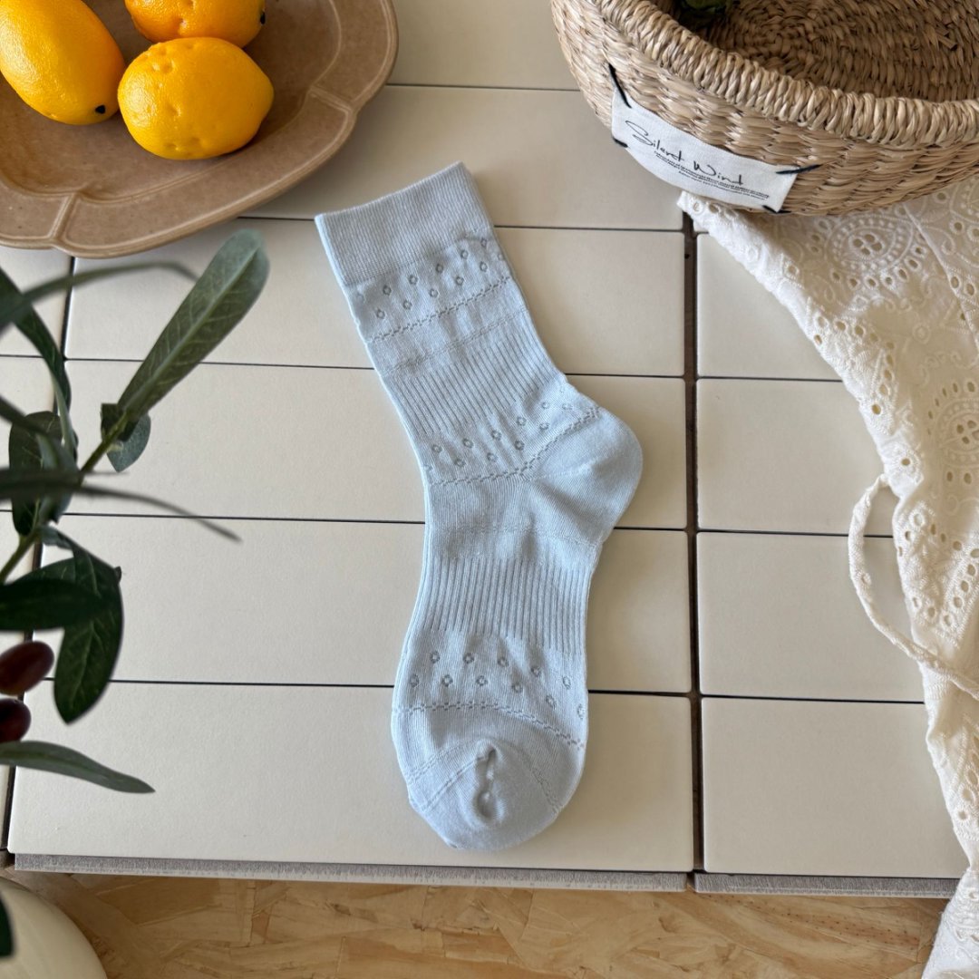 Sea Salt Blue ribbed sock with a straight cuff and small eyelet bands