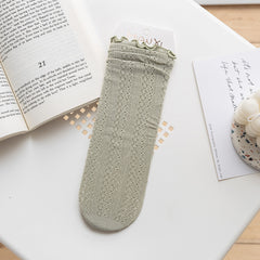 Pale Green openwork socks with rippled cuff edges