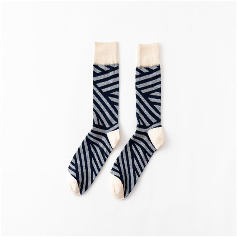 Pair of Diagonal Stripe crew socks with dark lines, gray backgrounds and cream cuffs, heels and toes