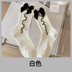 White with Black Bow wave-trim crew socks, sold as one selected pair