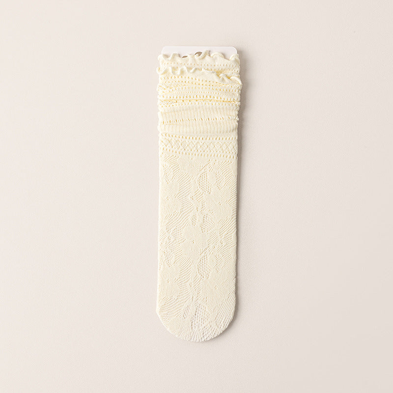 An Ivory rose lace sock displayed flat, showing horizontal openwork bands and a scalloped edge