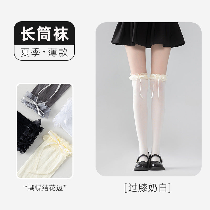 Milky White long socks with ruffle cuffs and ribbon tails