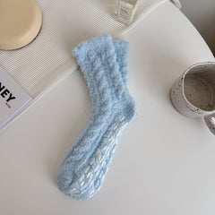 Sky Blue crew socks with a wavy cuff edge and raised cable-like pattern