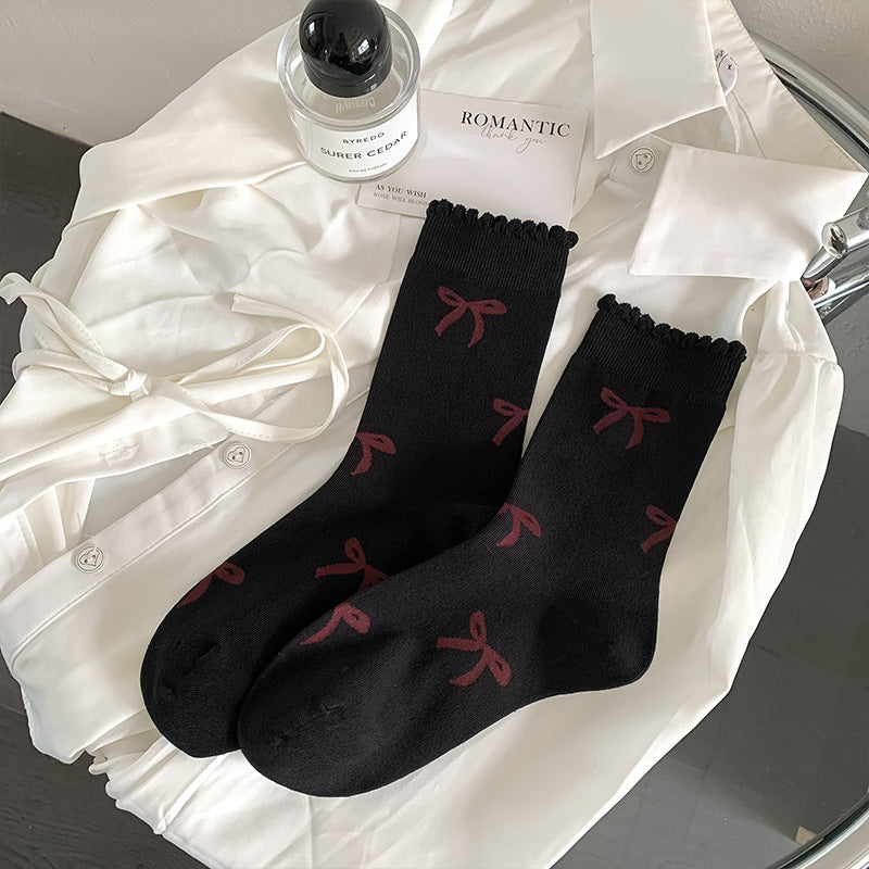 Black Bows socks, sold as one pair in the selected style