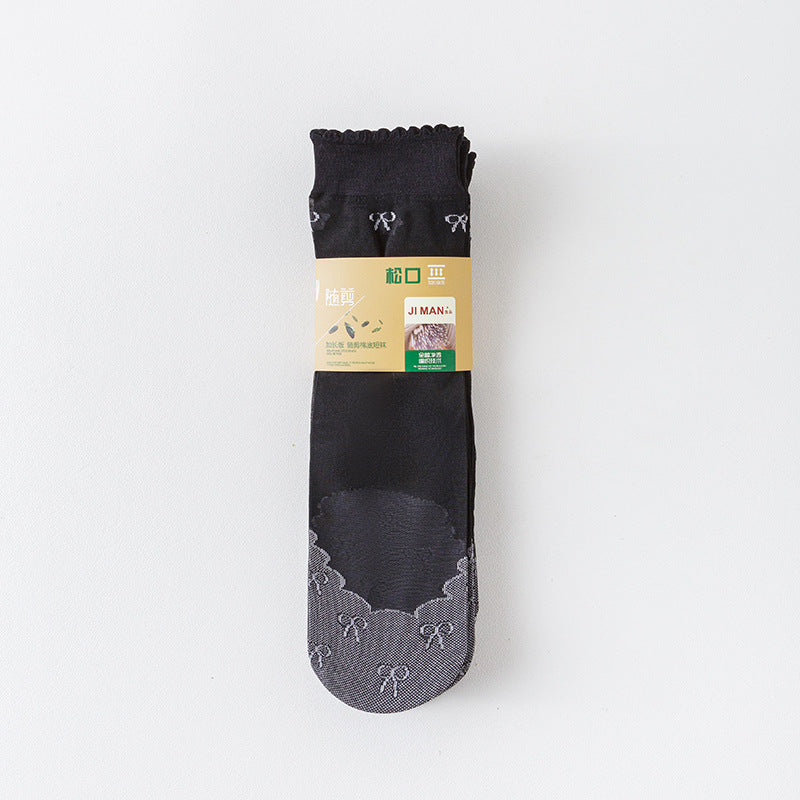 Mini bow sheer ankle socks in the selected Black color